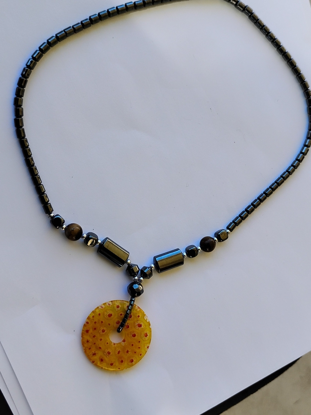 Black Hematite Beaded Necklace with Yellow Millefiori Floral Donut Pendant